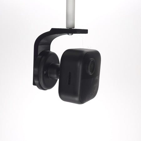 3D-printed black soffit and ceiling mount securely for Blink Outdoor 4 security camera.