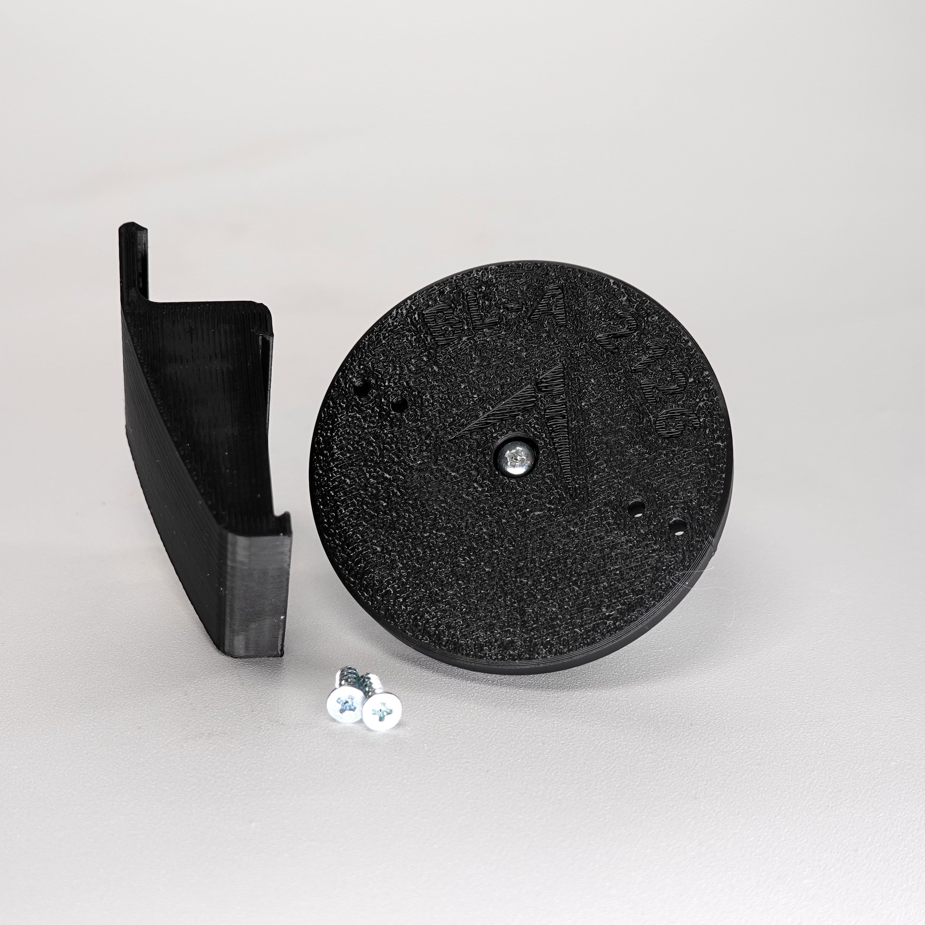 3D-printed Dutch lap siding clip and circular mounting base for a Blink camera, include screws.