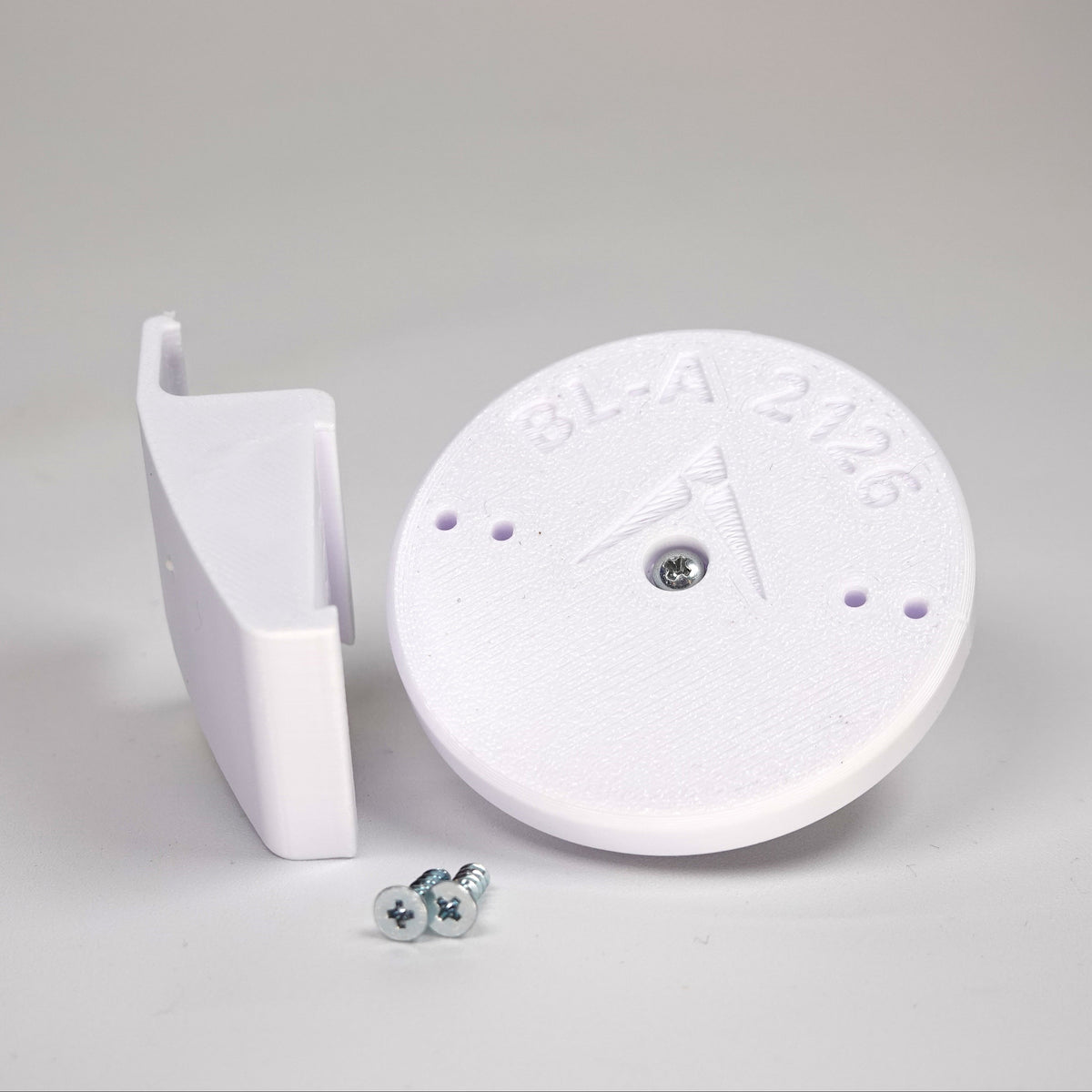 3D-printed Dutch lap siding clip and circular mounting base for a Blink camera, include screws.