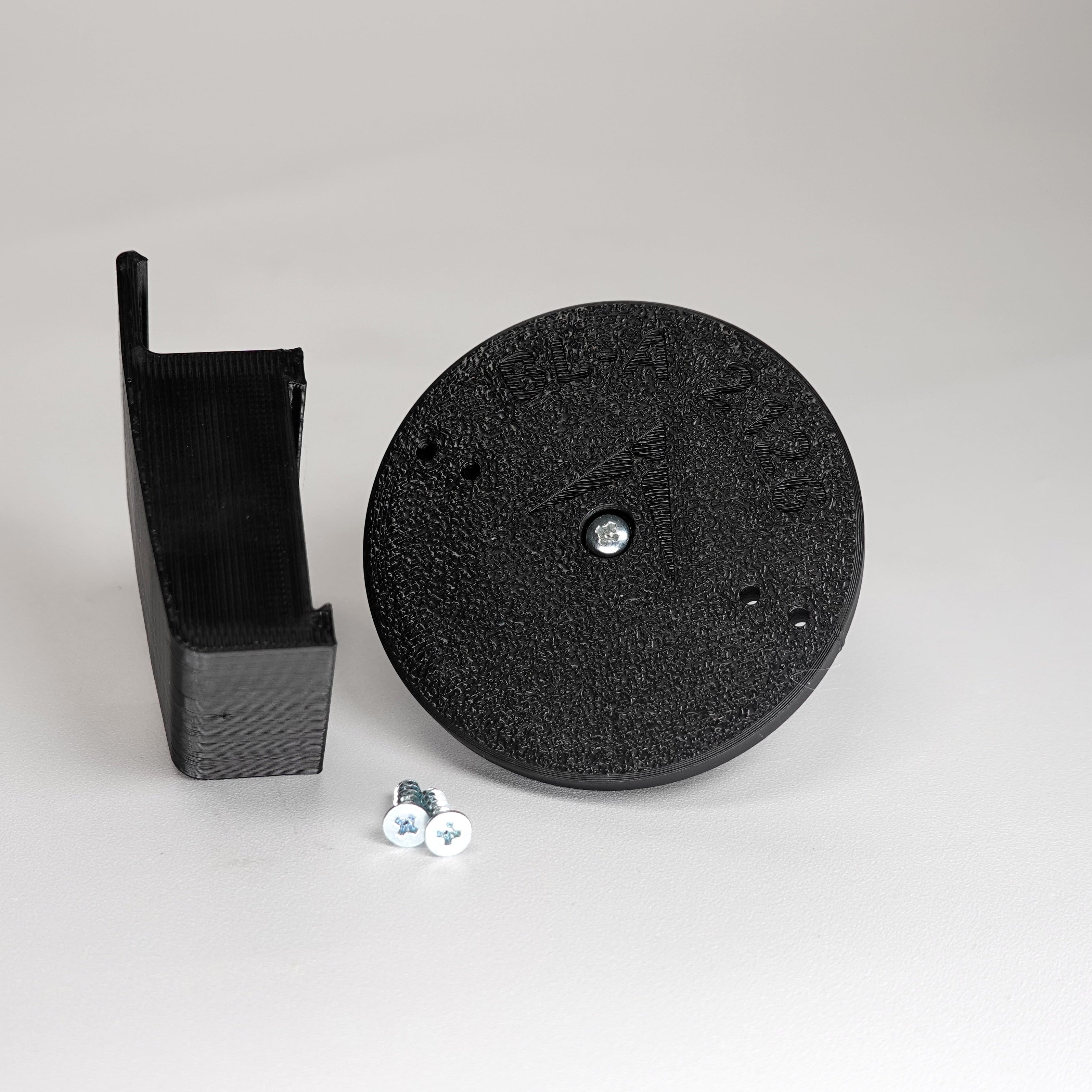 3D-printed traditional vinyl siding clip and circular mounting base for a Blink camera, include screws.