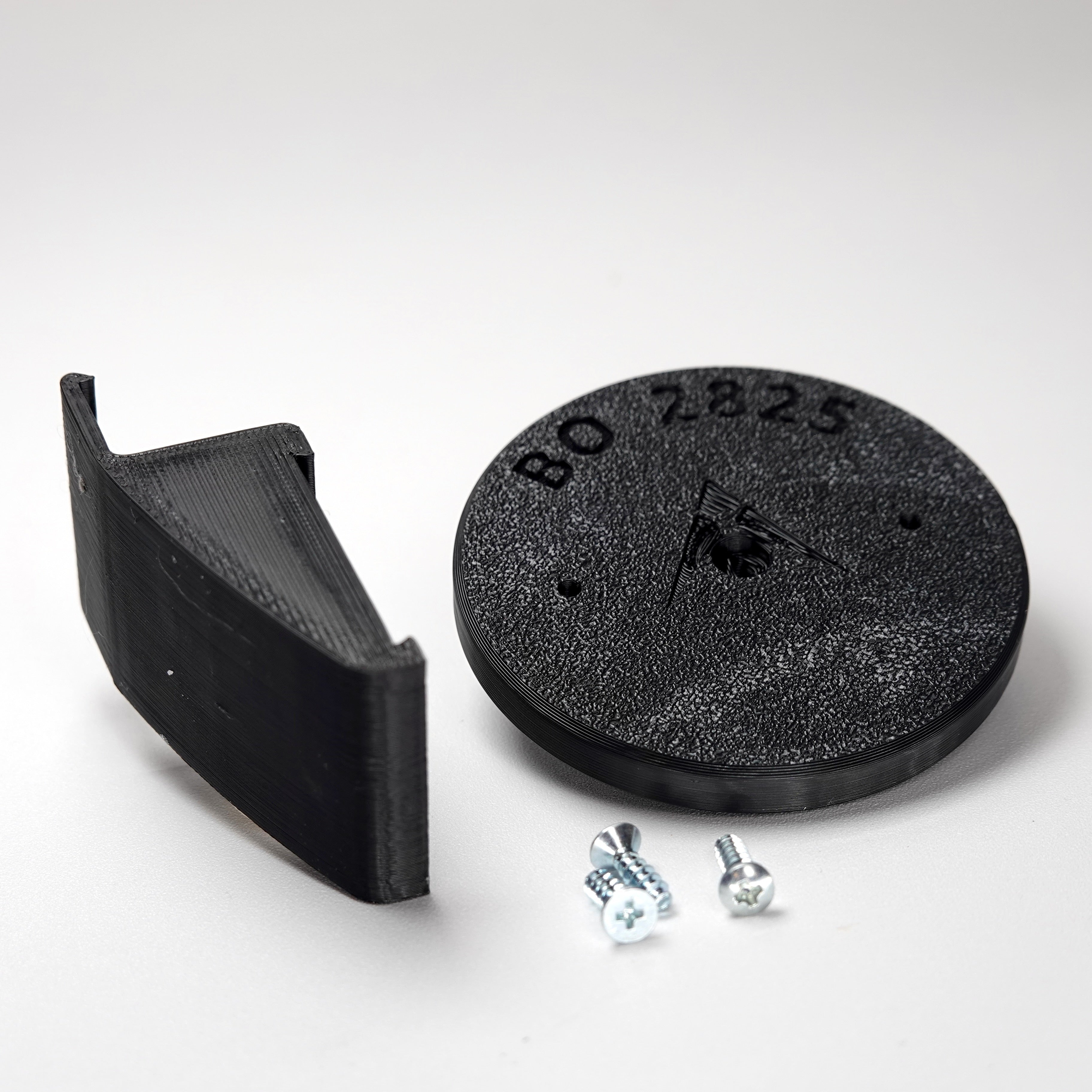 3D-printed Dutch lap siding clip and circular mounting base for a Blink camera, include screws.