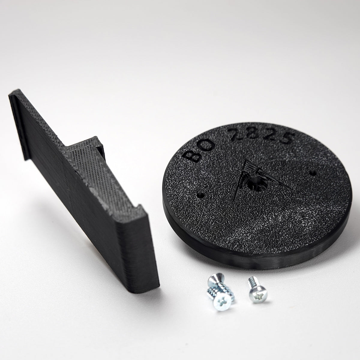3D-printed plank siding clip and circular mounting base for a Blink camera, include screws.