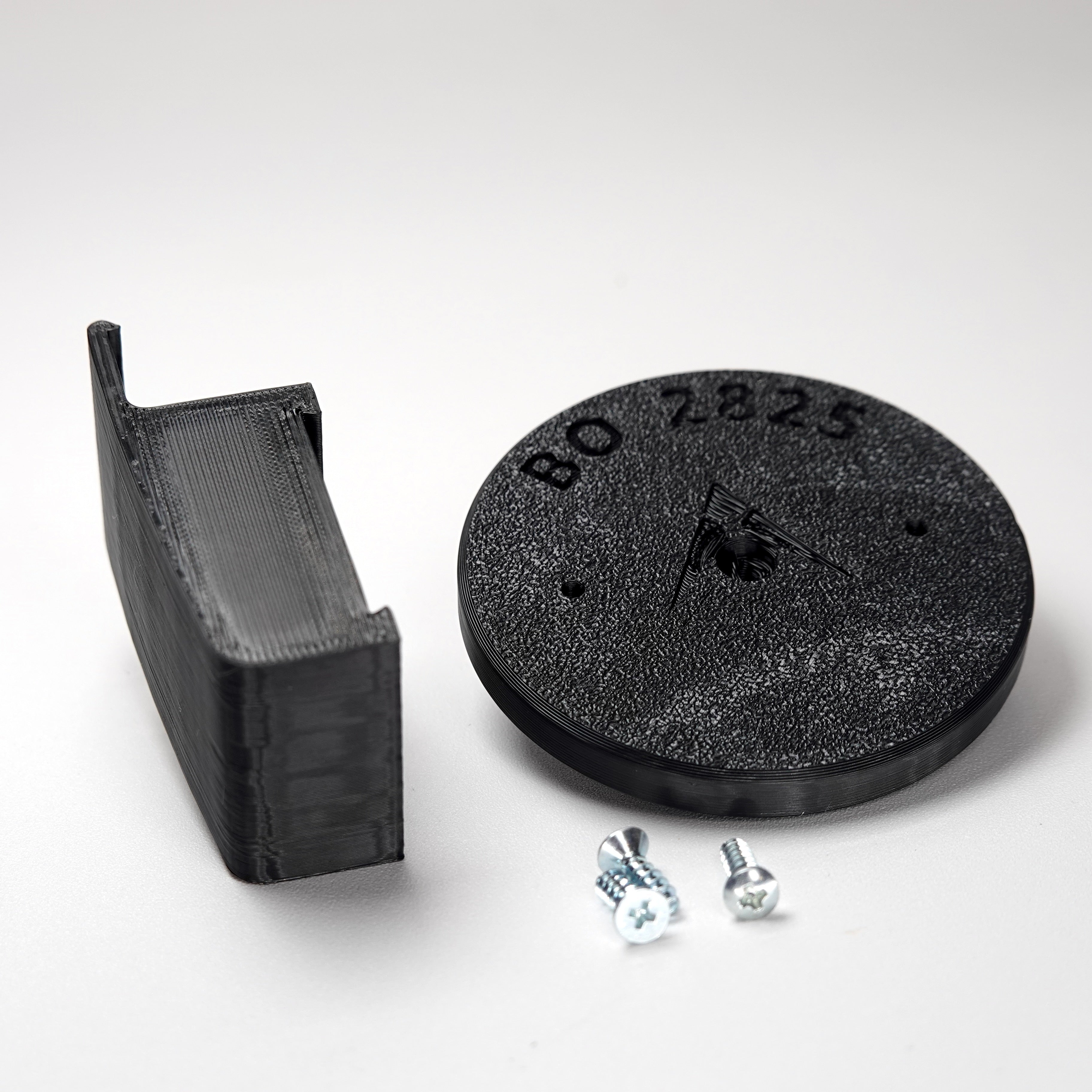 3D-printed traditional vinyl siding clip and circular mounting base for a Blink camera, include screws.