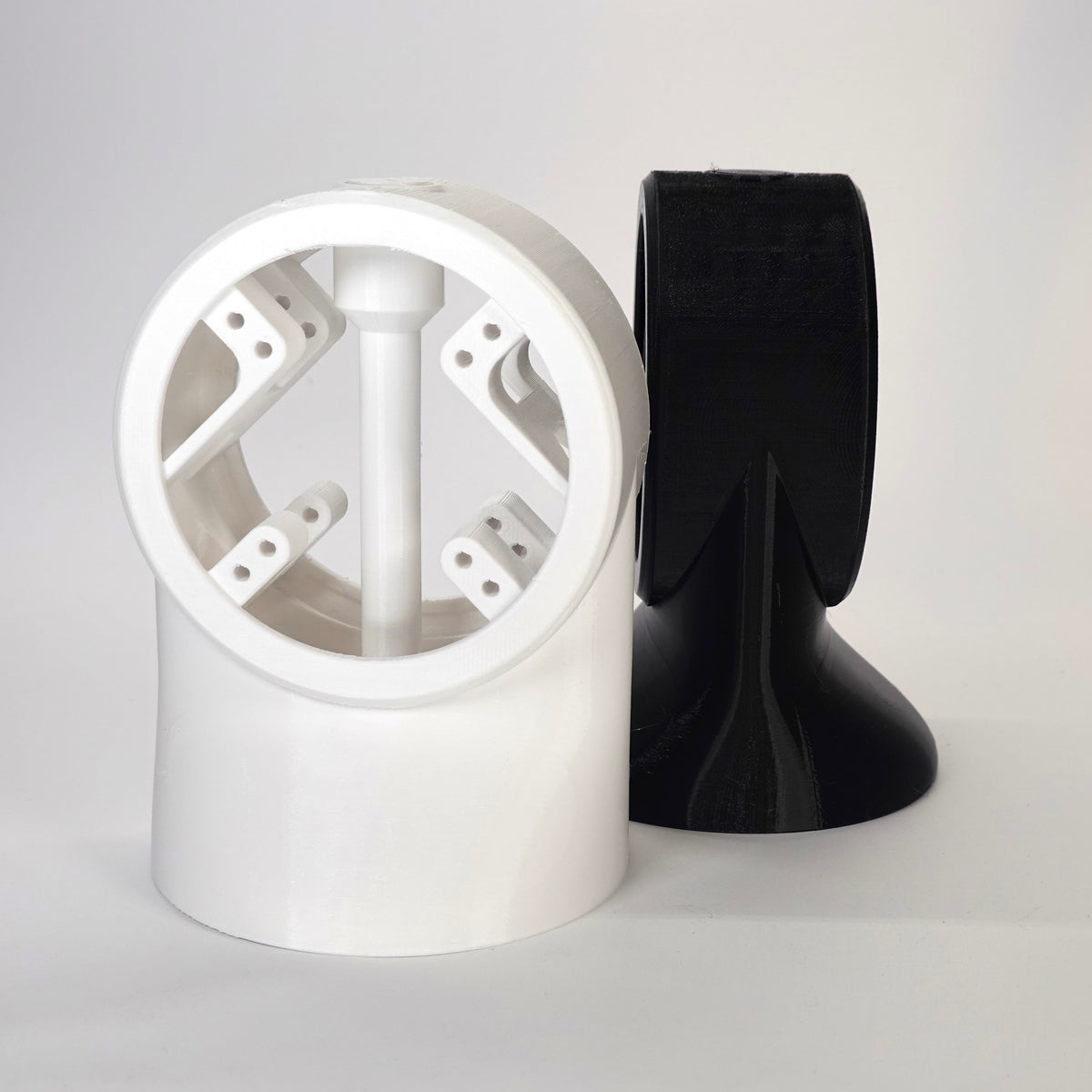 Slim 90° Dual Soffit Mounts for floodlight cameras.
