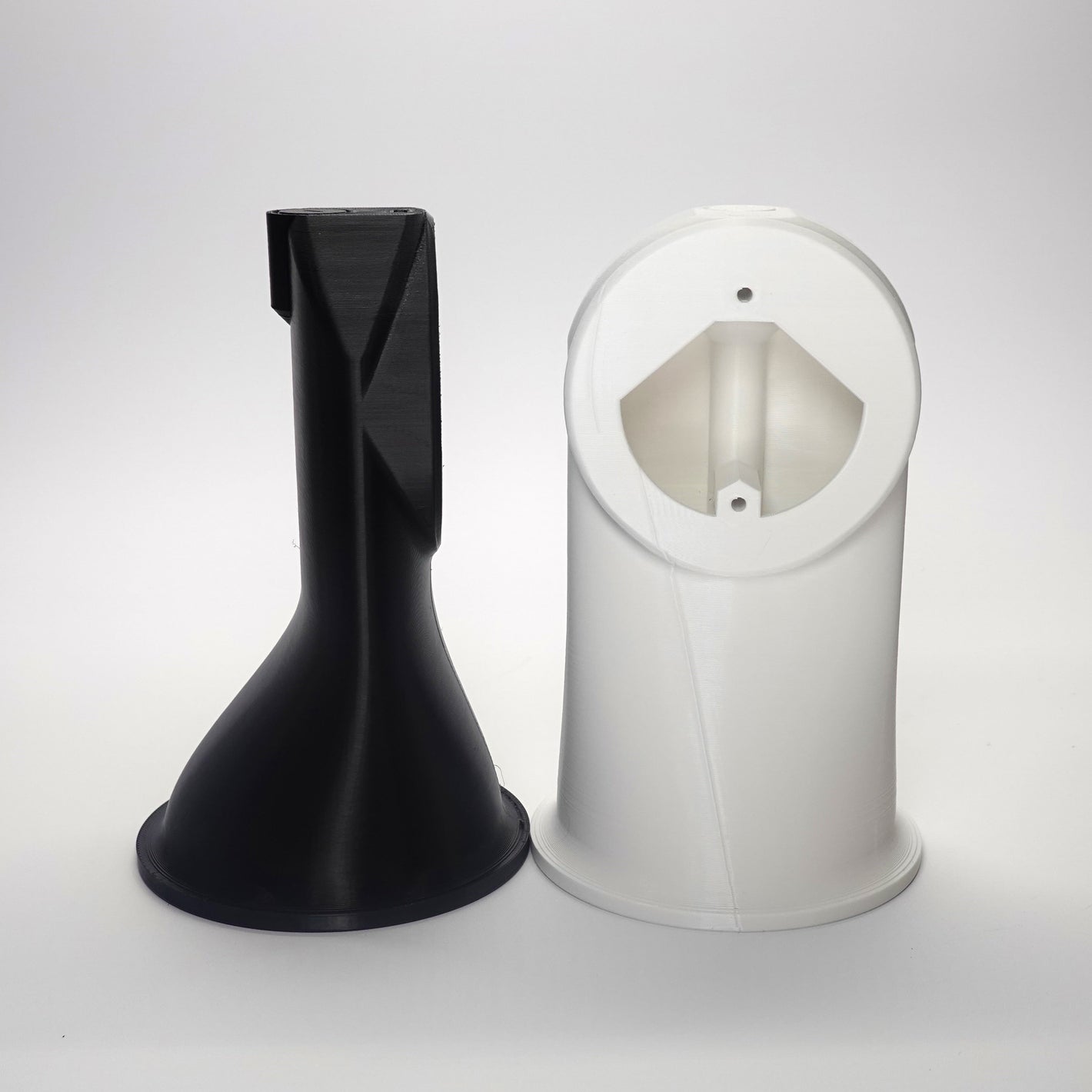 Eve Outdoor Cam Single Soffit Mount in black and white.