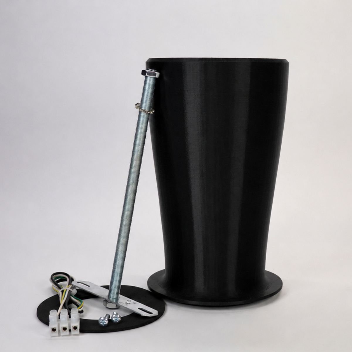 Black 3D-printed 200mm soffit drop extension kit for floodlight cameras, including a steel support rod, weatherproof gasket, and wiring hardware.
