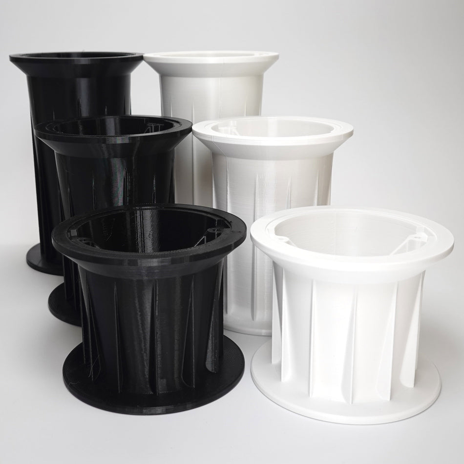 Soffit drop extensions for floodlight cameras.