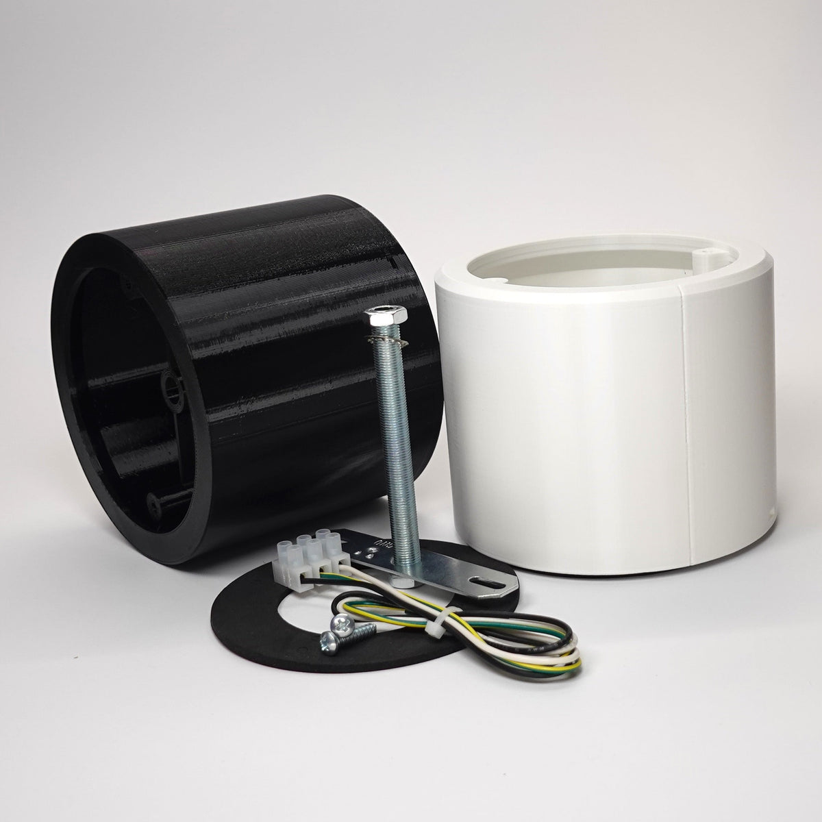 Cylindrical wall standoff extensions for floodlight cameras shown with mounting hardware, including a metal crossbar, screws, and wiring.