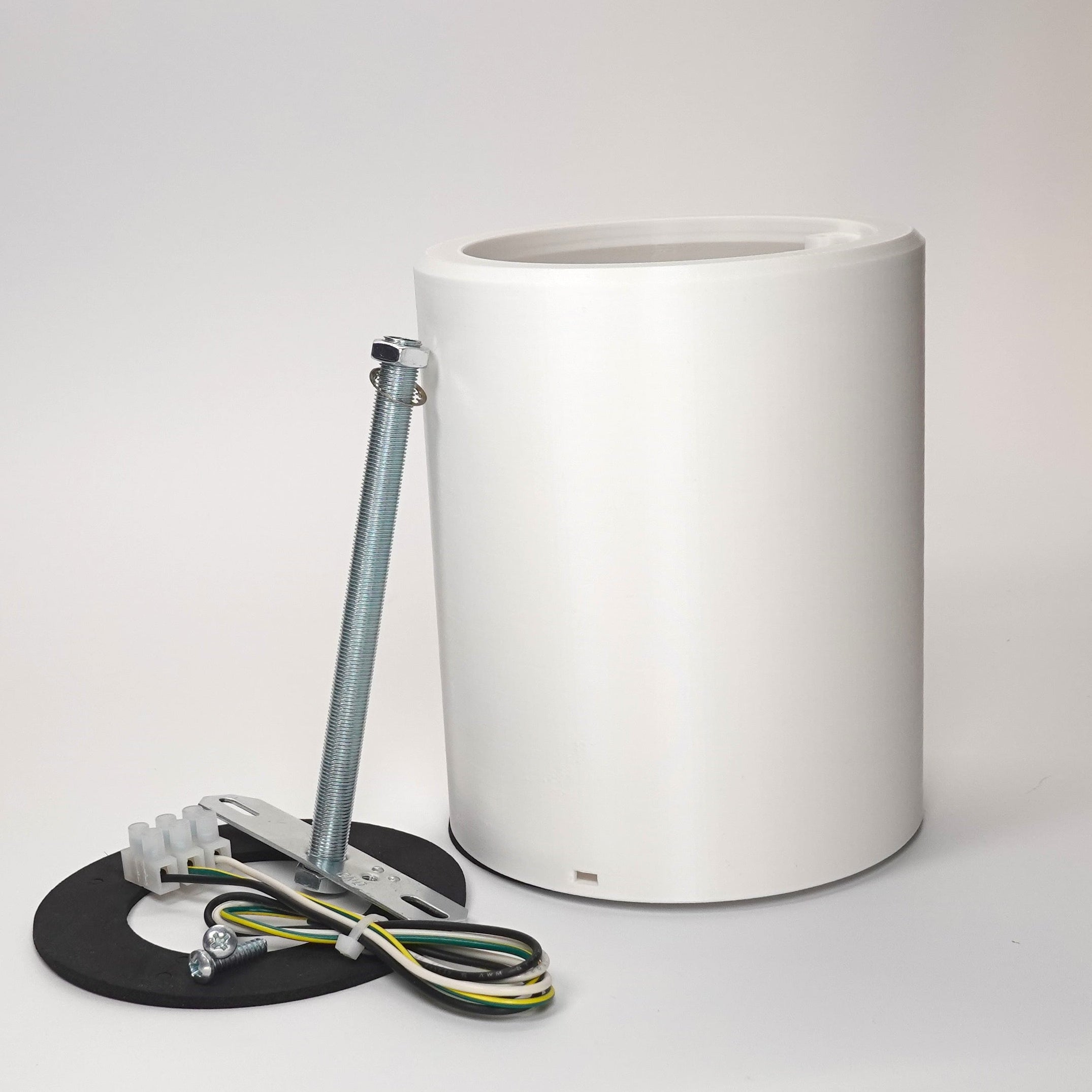 White 150mm cylindrical wall standoff extension for floodlight cameras.