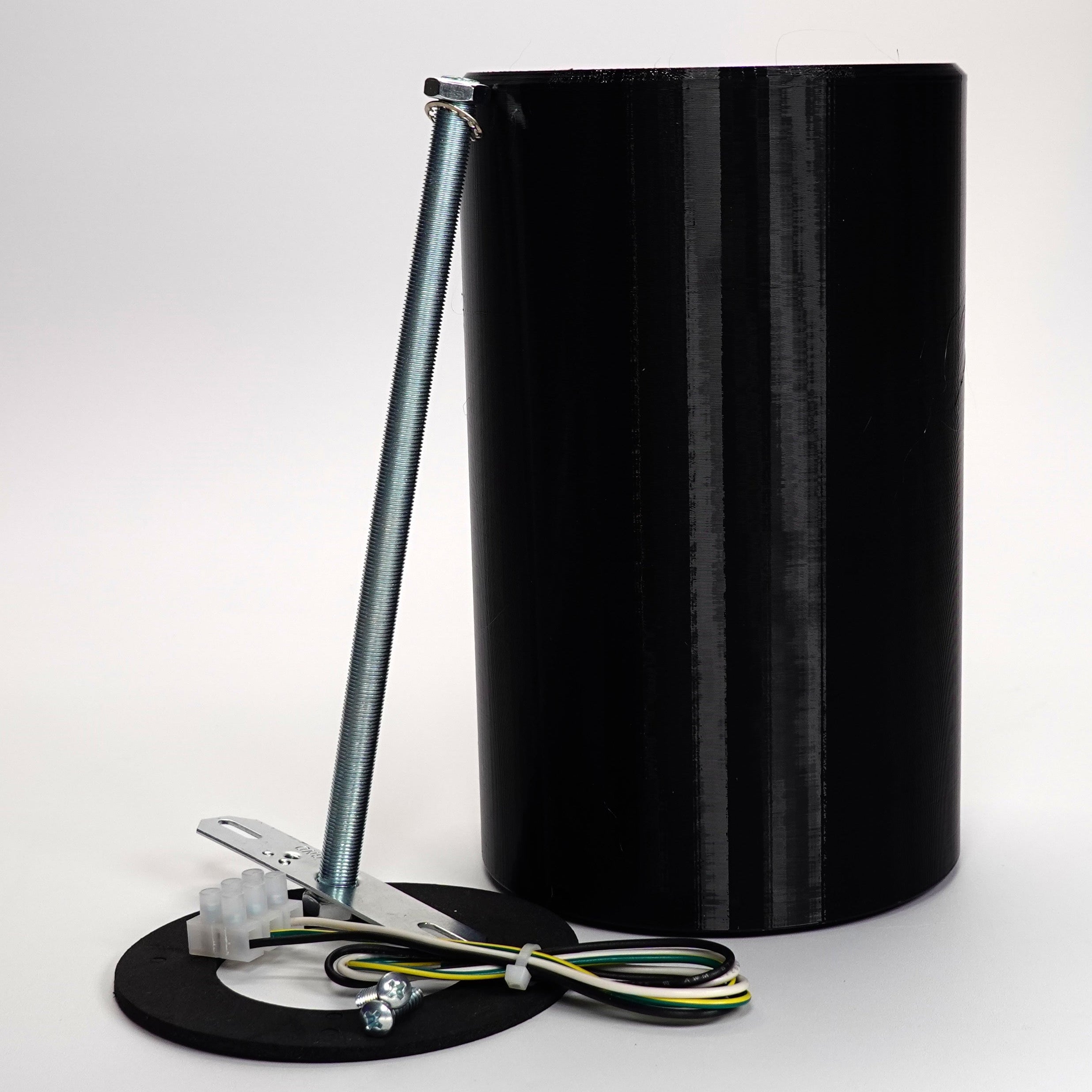 Black 200mm  cylindrical wall standoff extension for floodlight cameras.