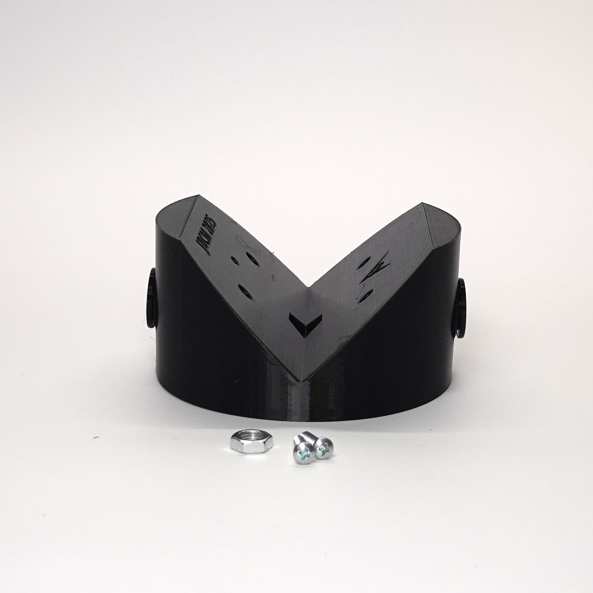 Black outside corner mount junction box for floodlights and cameras.