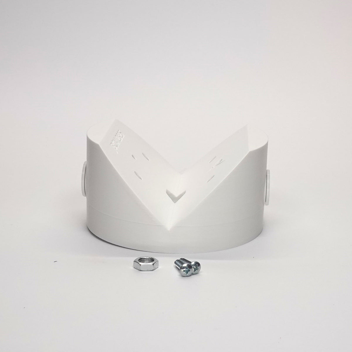White outside corner mount junction box for floodlights and cameras.