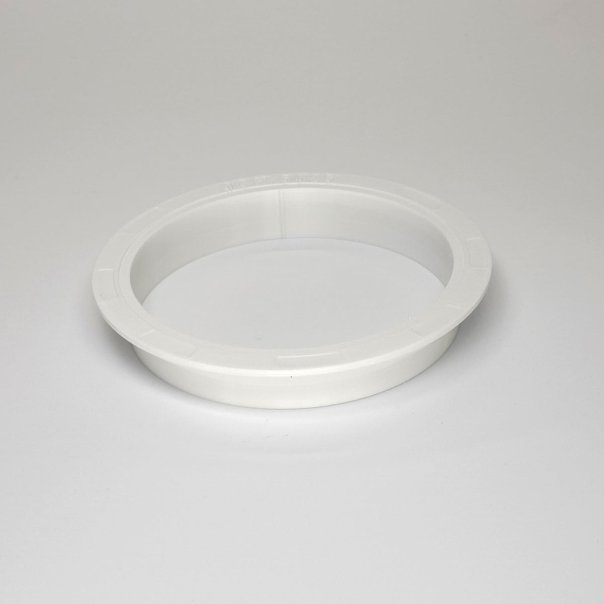 White pancake weatherproof junction box cover.
