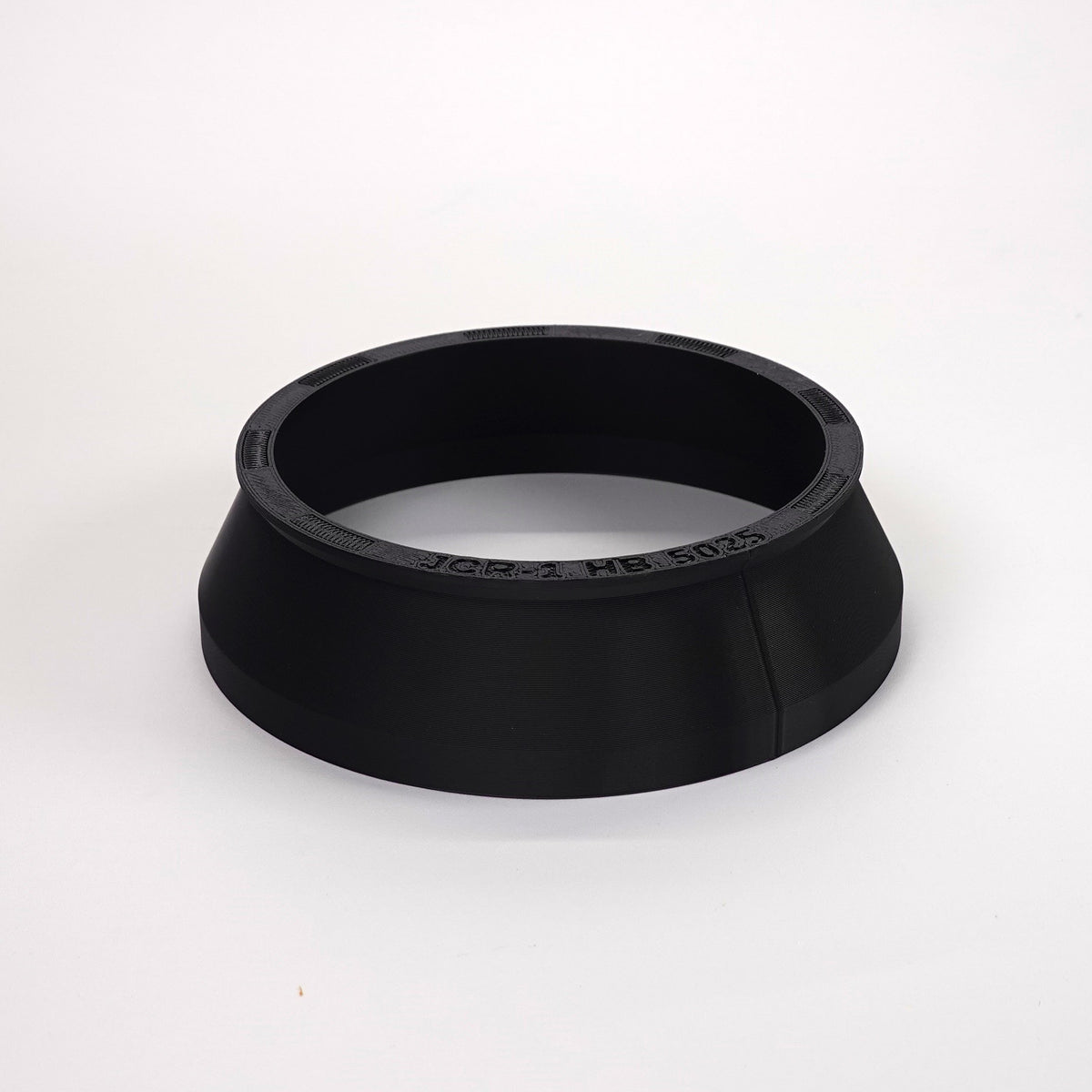 Black round weatherproof junction box cover.