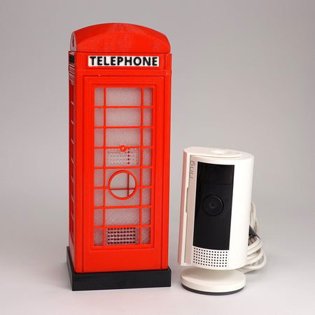 3D-printed miniature British K6 telephone box case for Ring Indoor Cam Gen 2.