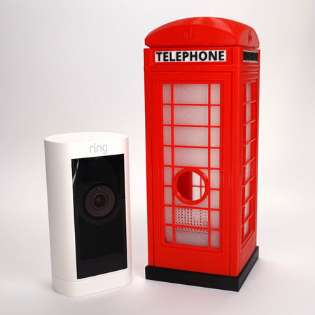 3D-printed red London K6 telephone box case for Ring Stick Up Cam Pro.