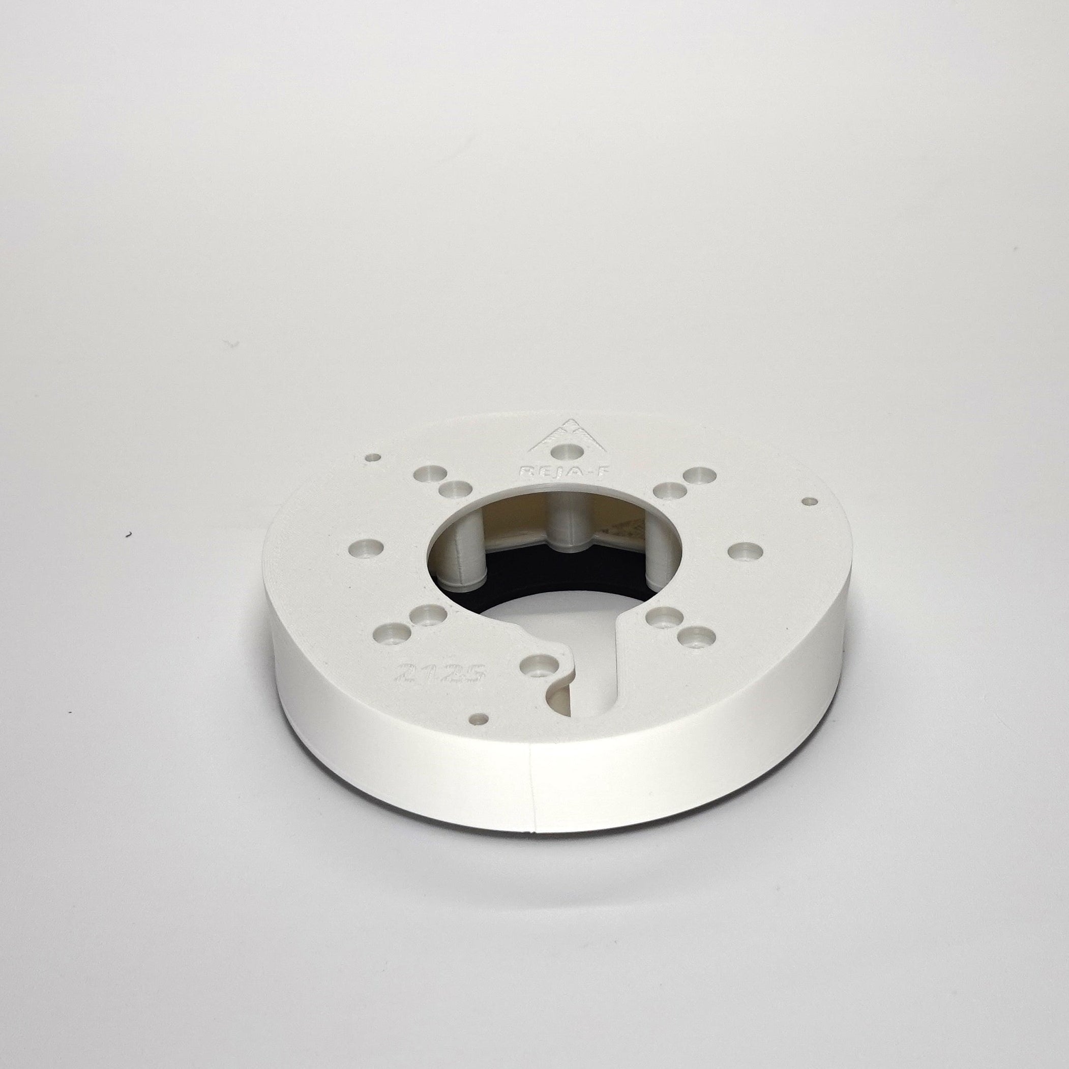 White 3D-printed Junction Box Adapter (F) for Reolink.