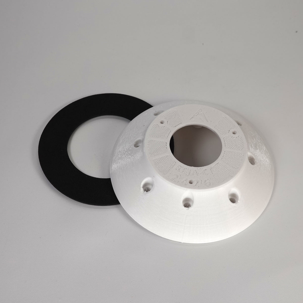 White 3D-printed junction box adapter ring for Reolink camera include gasket.