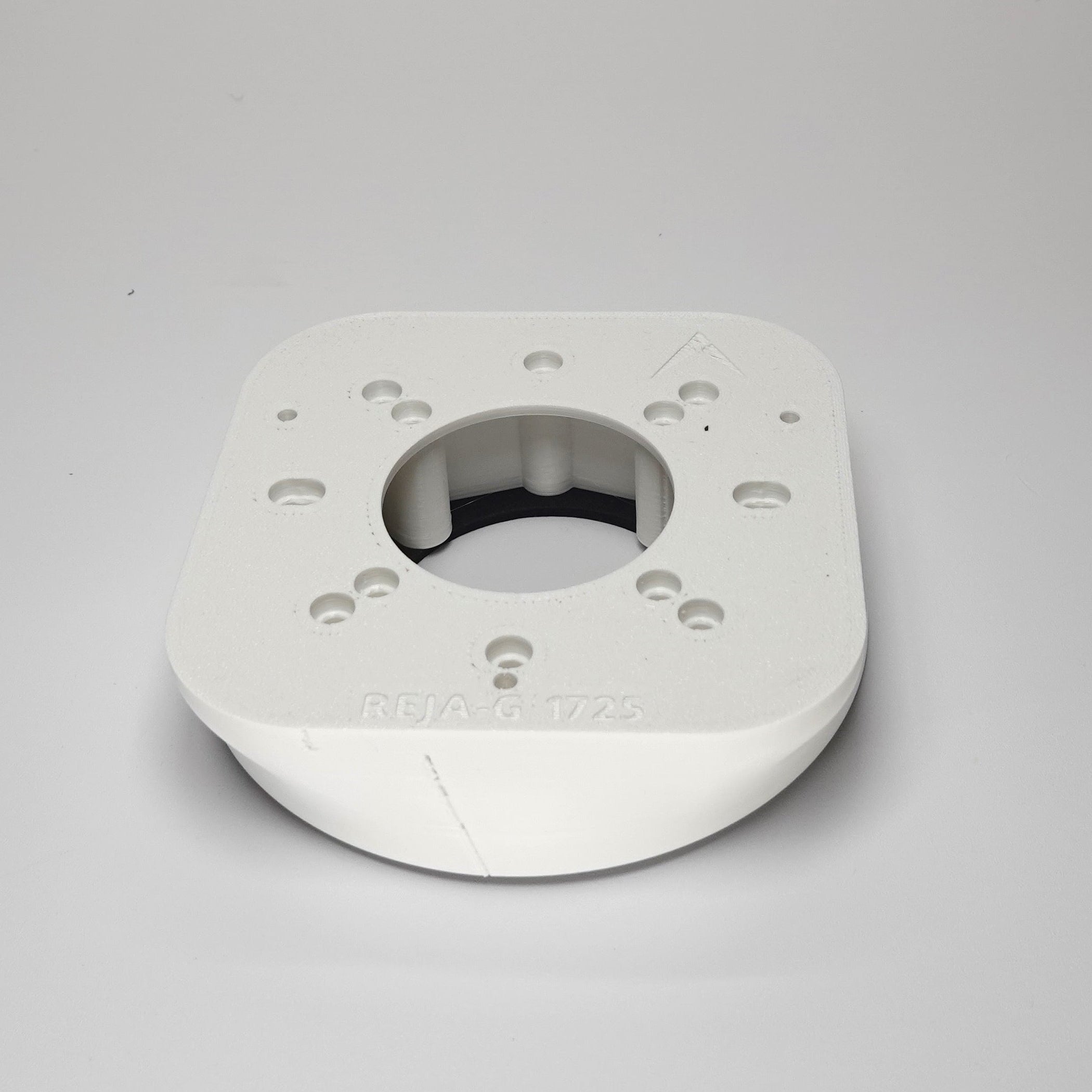 White 3D-printed Junction Box Adapter (G) for Reolink Duo Floodlight.