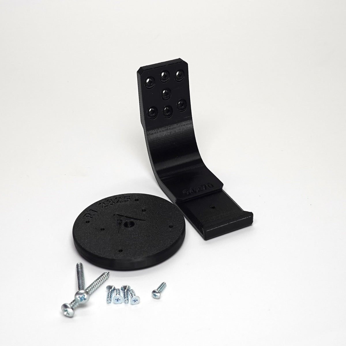 Black 3D-printed Ring camera mount kit featuring a curved arm bracket, include screws.