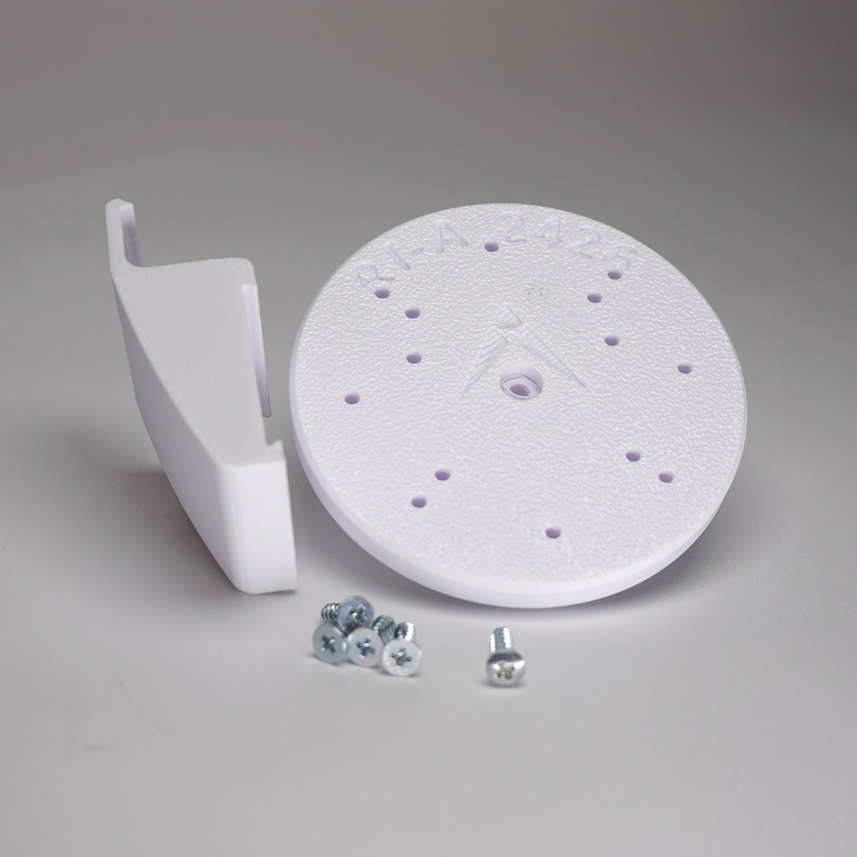 White 3D-printed Dutch Lap siding clip and circular mounting plate for ring Cam Siding Clips, include five mounting screws.