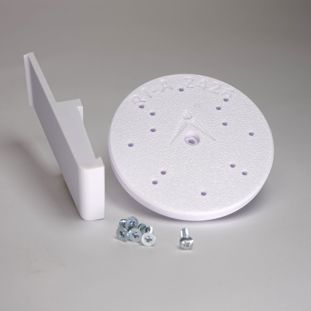 White 3D-printed Plank vinyl siding clip and circular mounting plate for ring Cam Siding Clips, include five mounting screws.