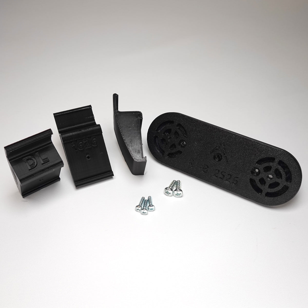 Black 3D-printed no-drill Dutch Lap siding clip kit for a Ring Solar Panel.