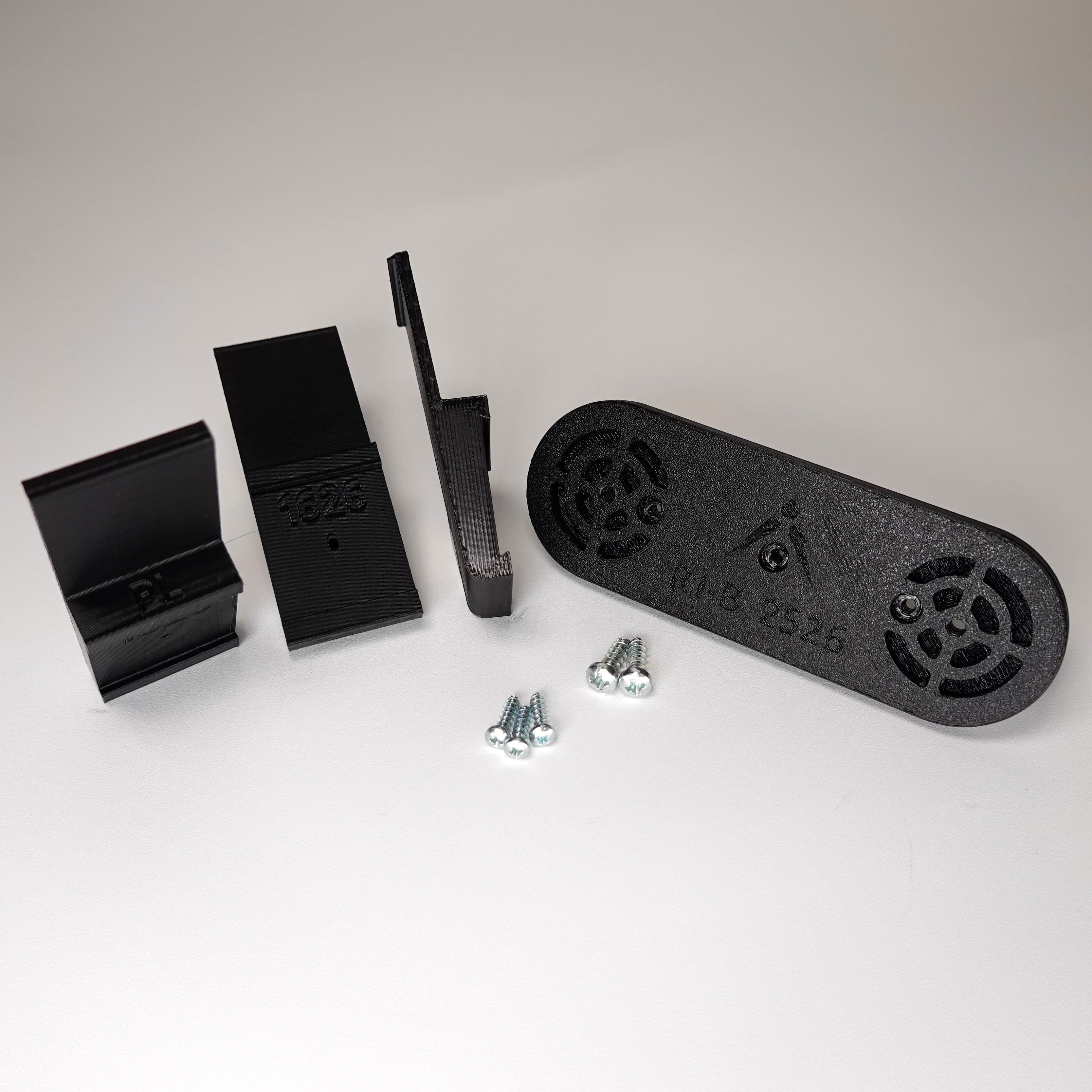 Black 3D-printed no-drill plank siding clip kit for a Ring Solar Panel.