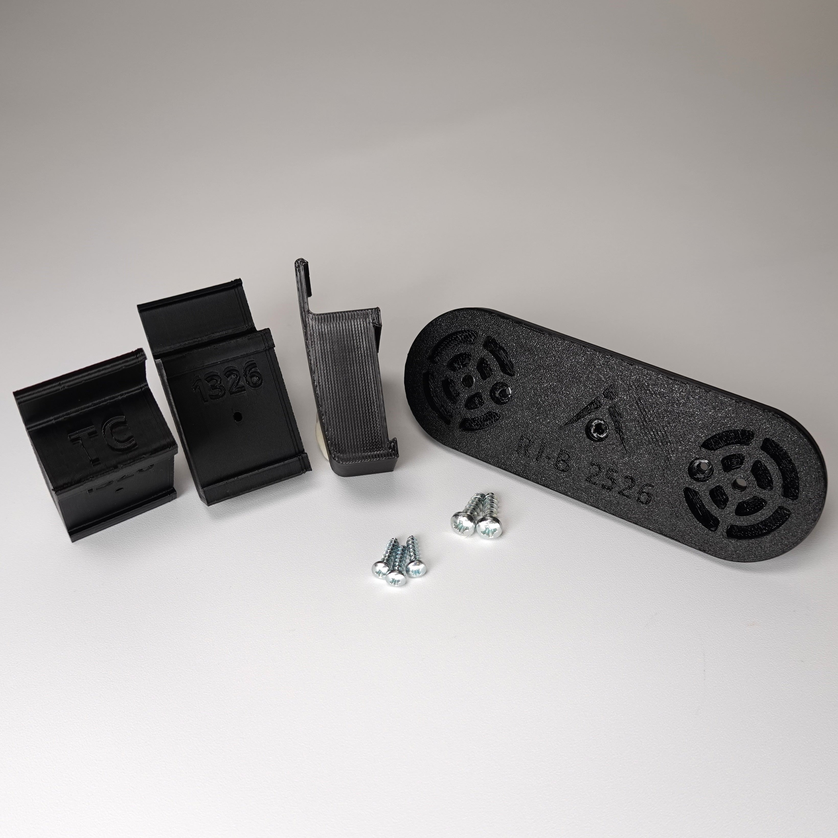 Black 3D-printed no-drill Traditional siding clip kit for a Ring Solar Panel.