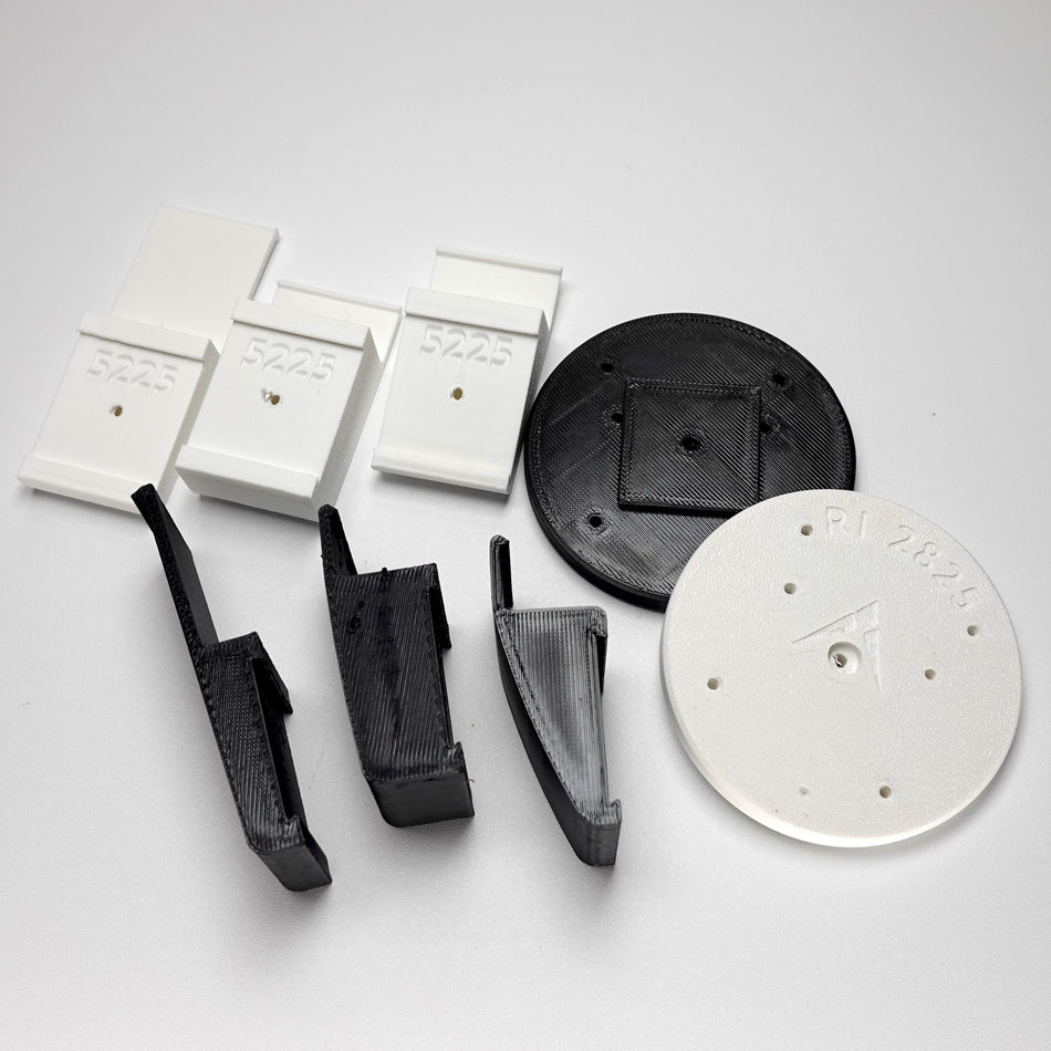 3D-printed mounting components for Ring cameras.