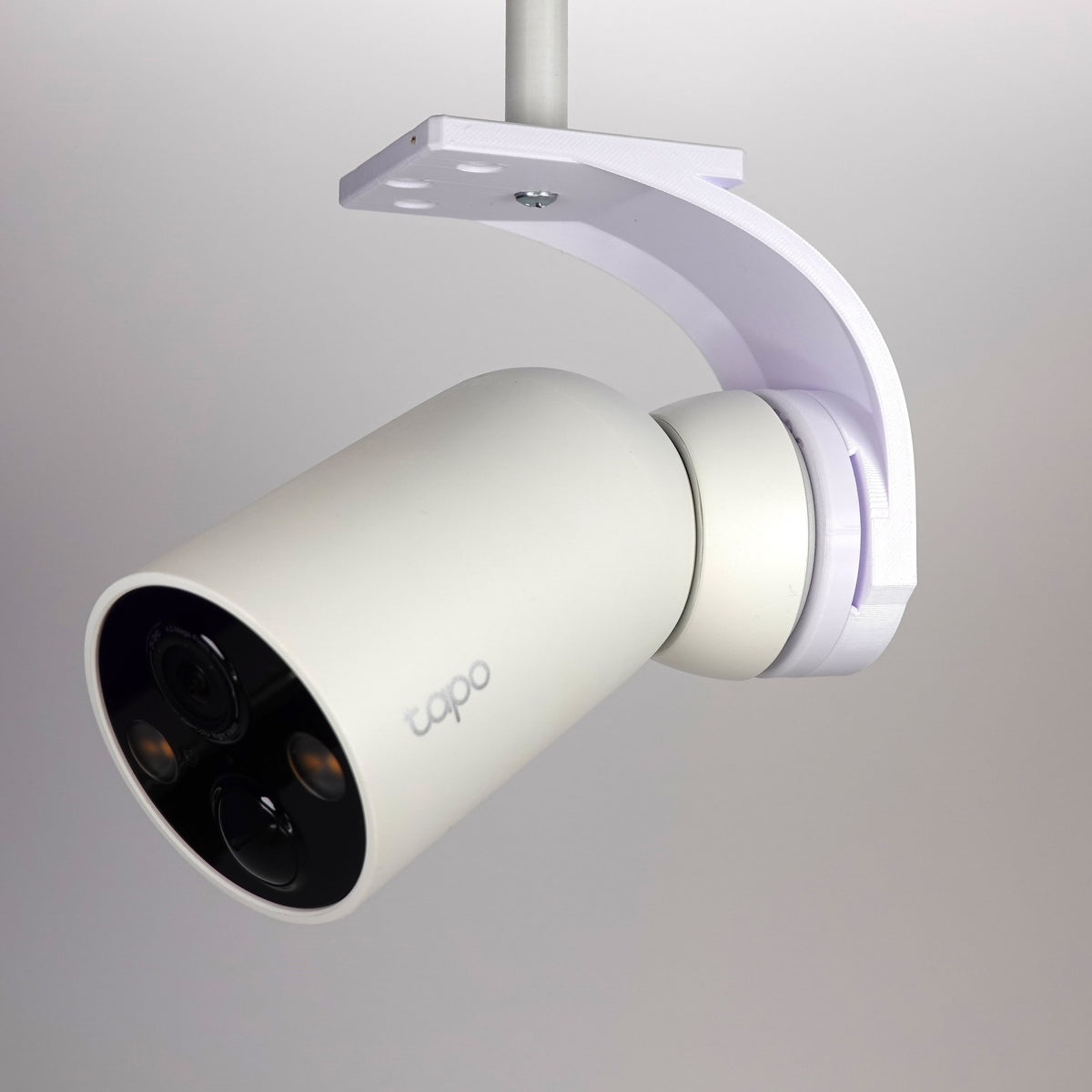 Soffit bracket mount for TP-Link Tapo security camera.