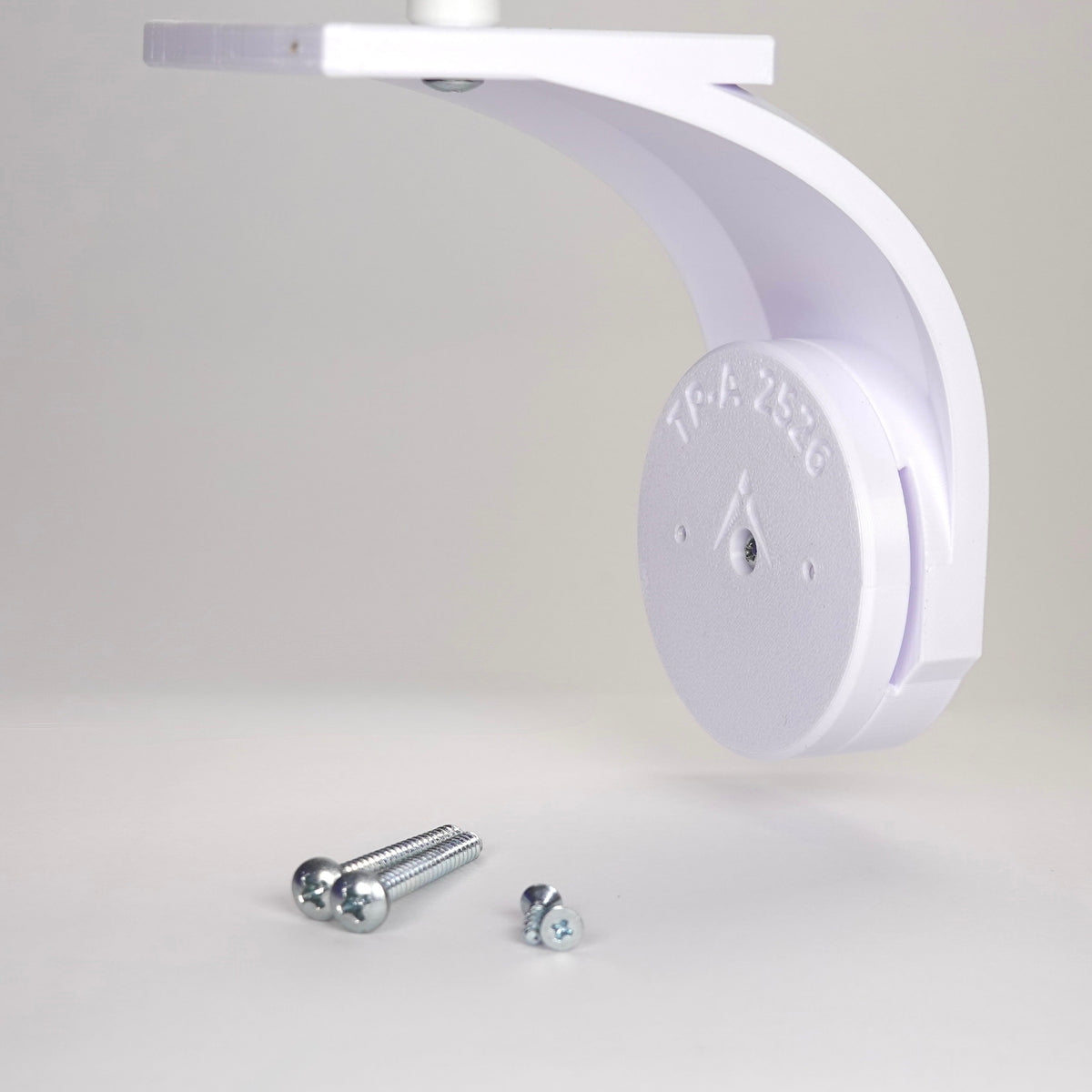 Soffit bracket mount for TP-Link Tapo security camera.