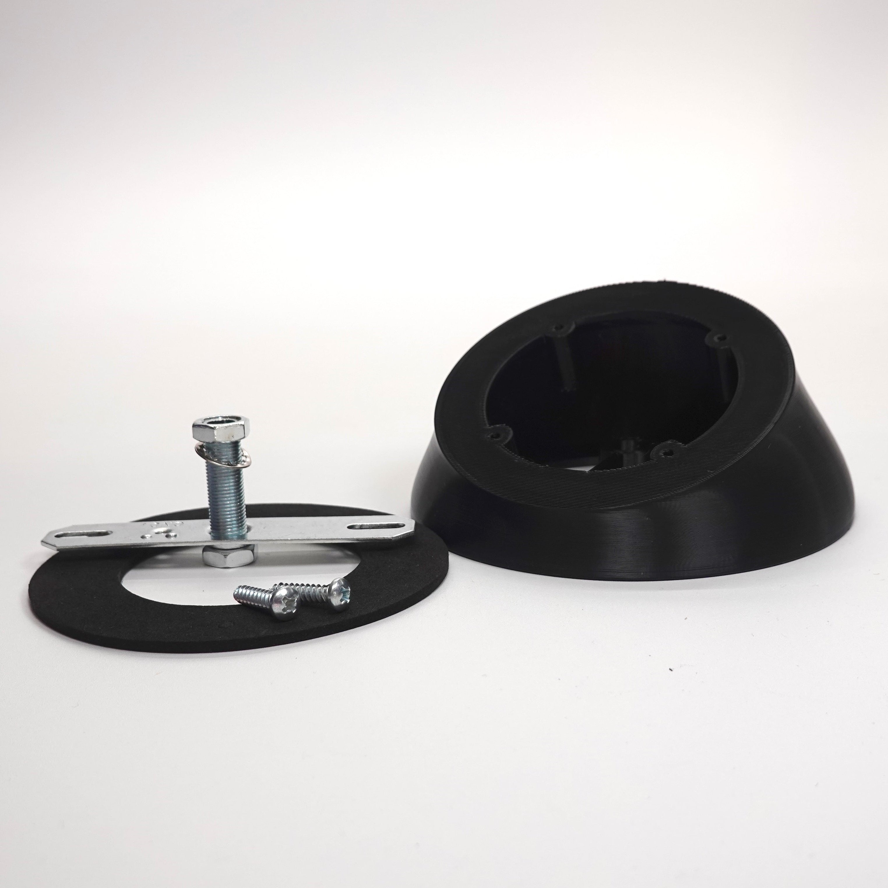 3D-printed angled soffit wedge for UniFi G Turret camera.